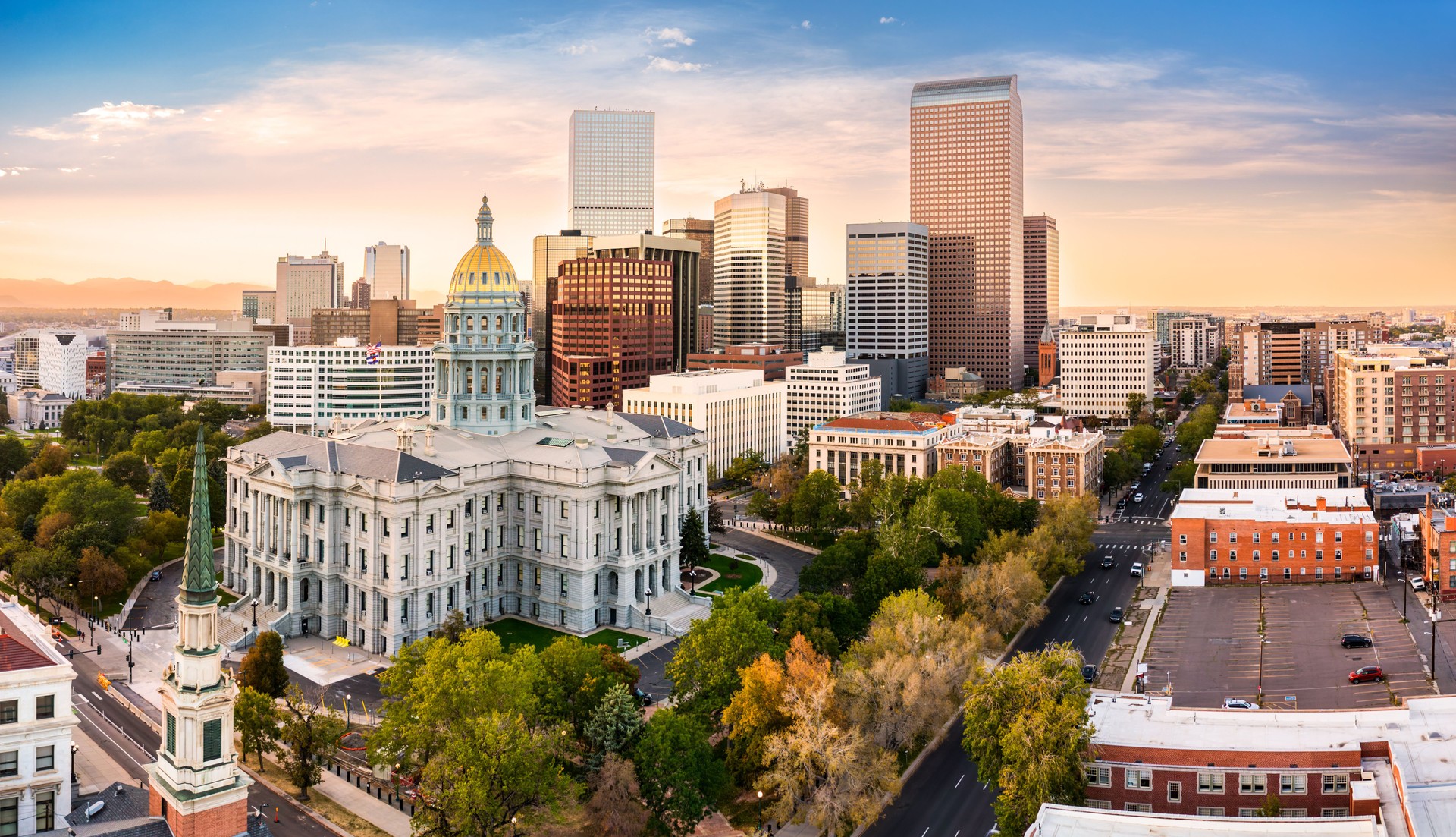 Colorado Capitol and Denver, Colorado skyline at sunset